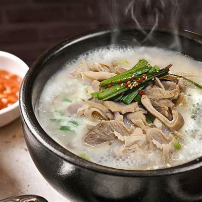  Dwaeji Gukbap: Uma sopa reconfortante de carne de porco com um toque picante de kimchi!